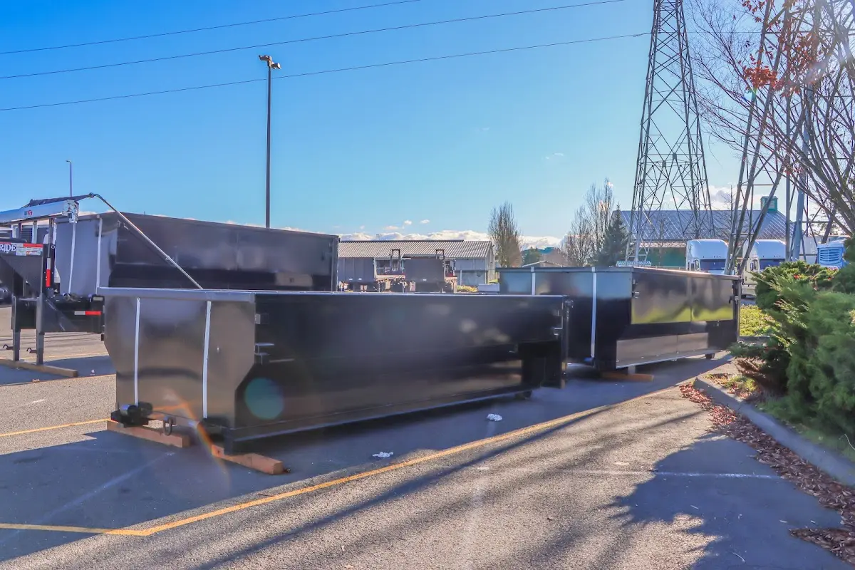 Roll-off dumpster ready for waste disposal at job site for 15 Yard Dumpster Rental in Cheshire